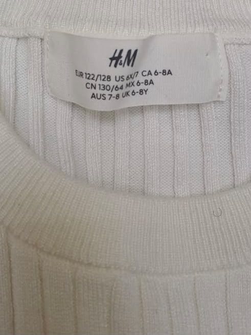 В'язана футболка · розмір EUR 122-128