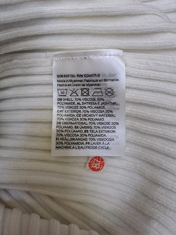 В'язана футболка · розмір EUR 122-128